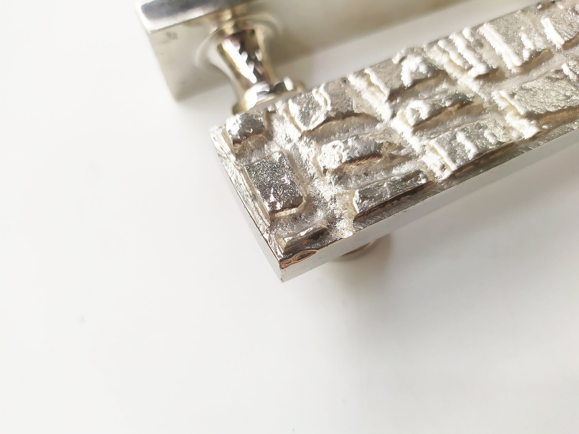 Metal with alligator skin texture handle pull in nickel plating , zoomed for details