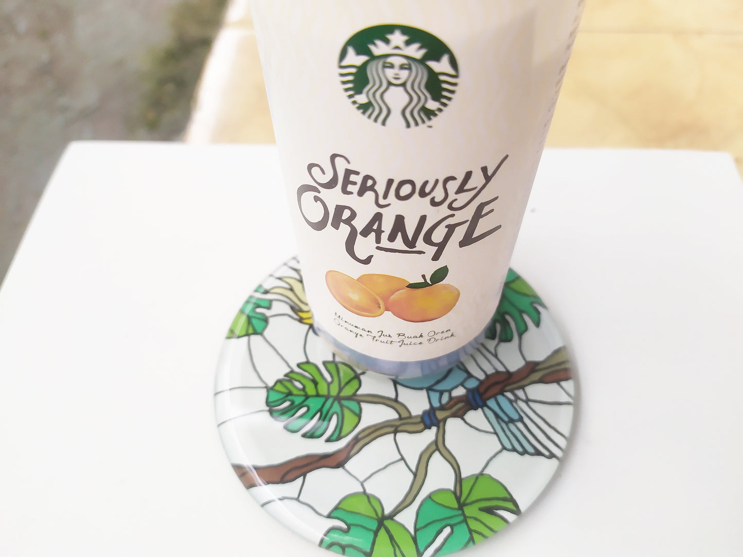 Mirror and glass hand painted bird coaster , with starbucks cup