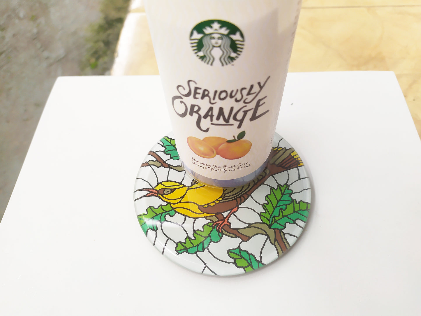 Hand painted Yellow tanager round mirror coaster , with starnucks cup
