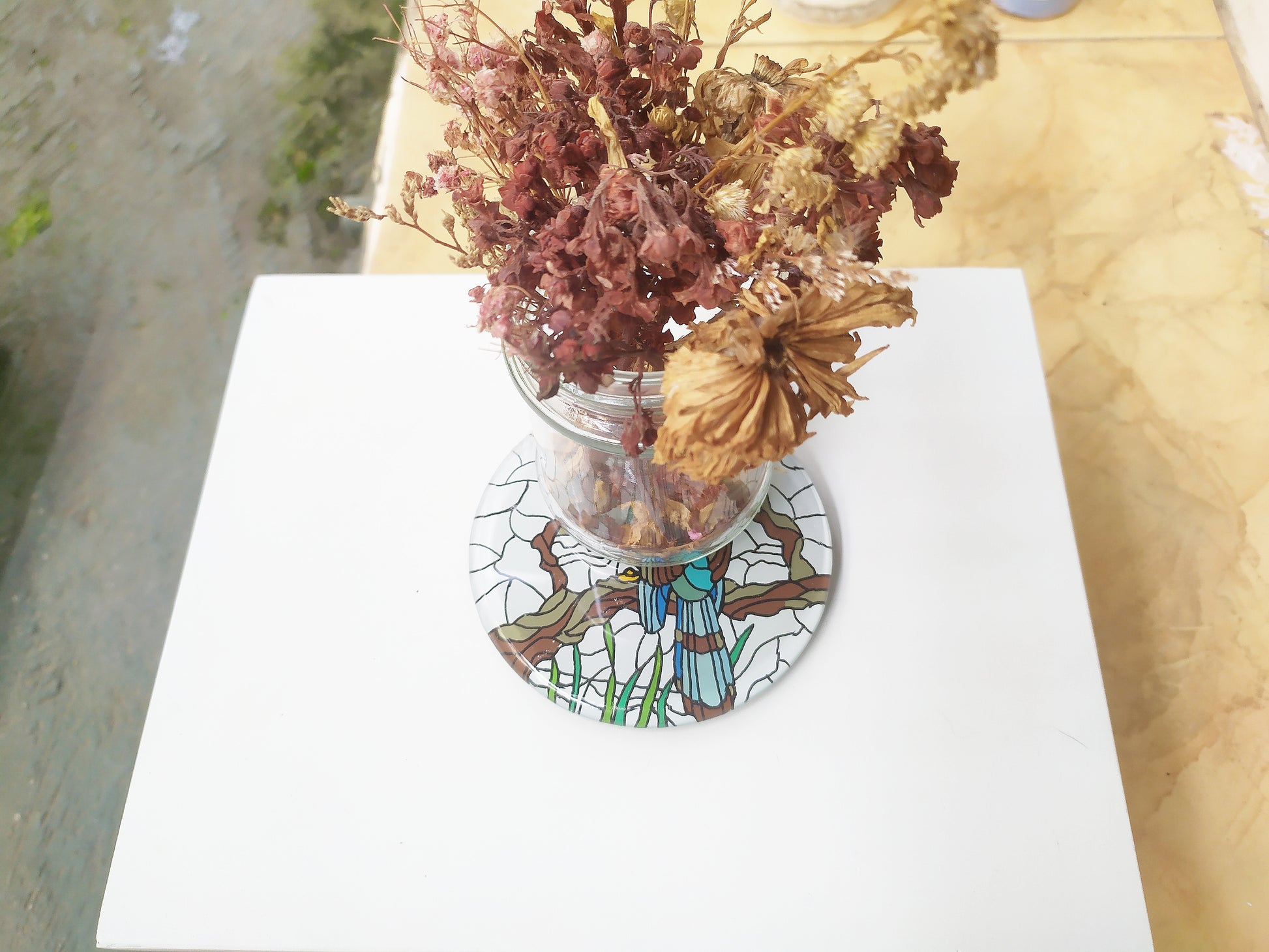 Mirror and glass hand painted bird coaster , with dry leaves