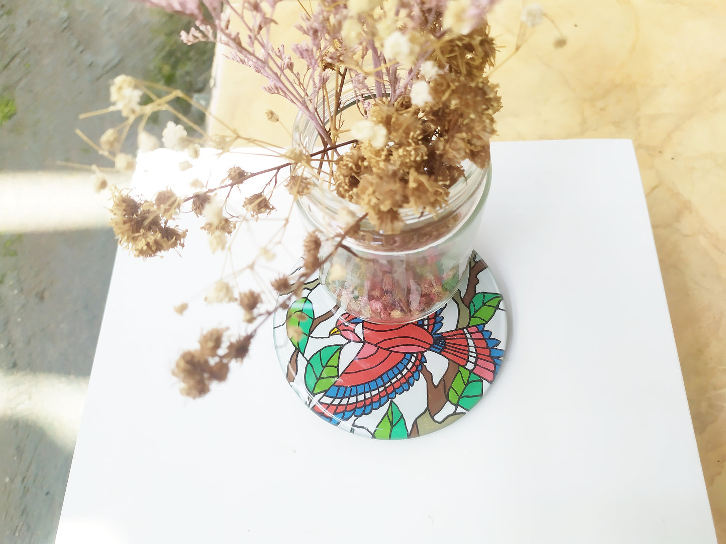 Bird animal round glass mirror coaster , with dry leaves