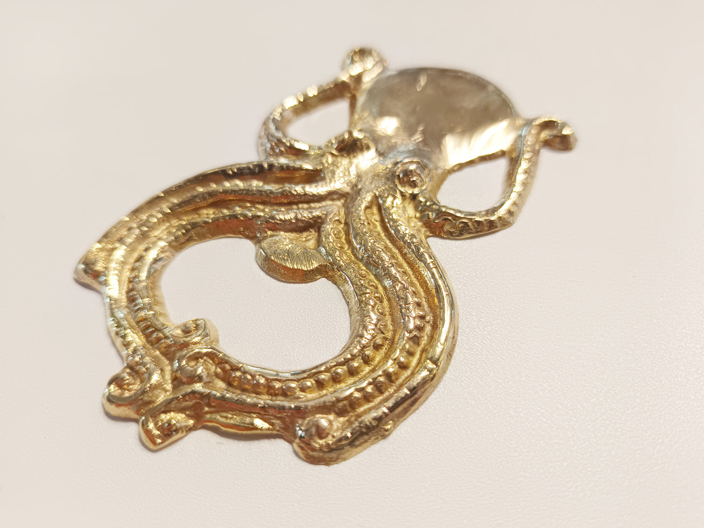 Octopus brass bottle opener, antique brass squid cap opener