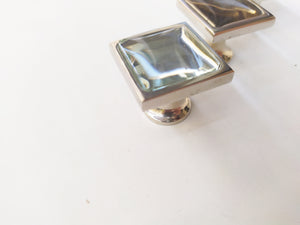 Inlaid square mirror knob in brass plated with nickel , from side view