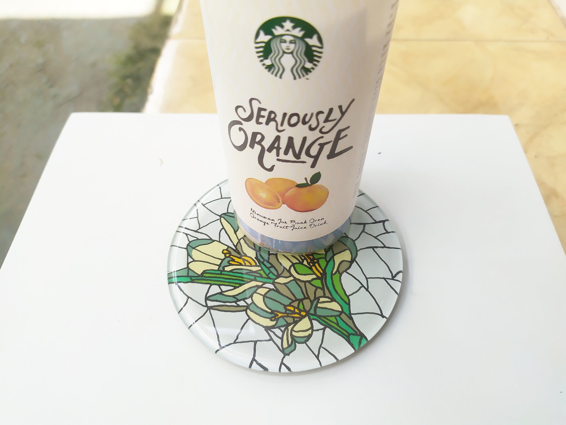 Reverse Painted White Daffodil round mirror coaster , with starbucks cup