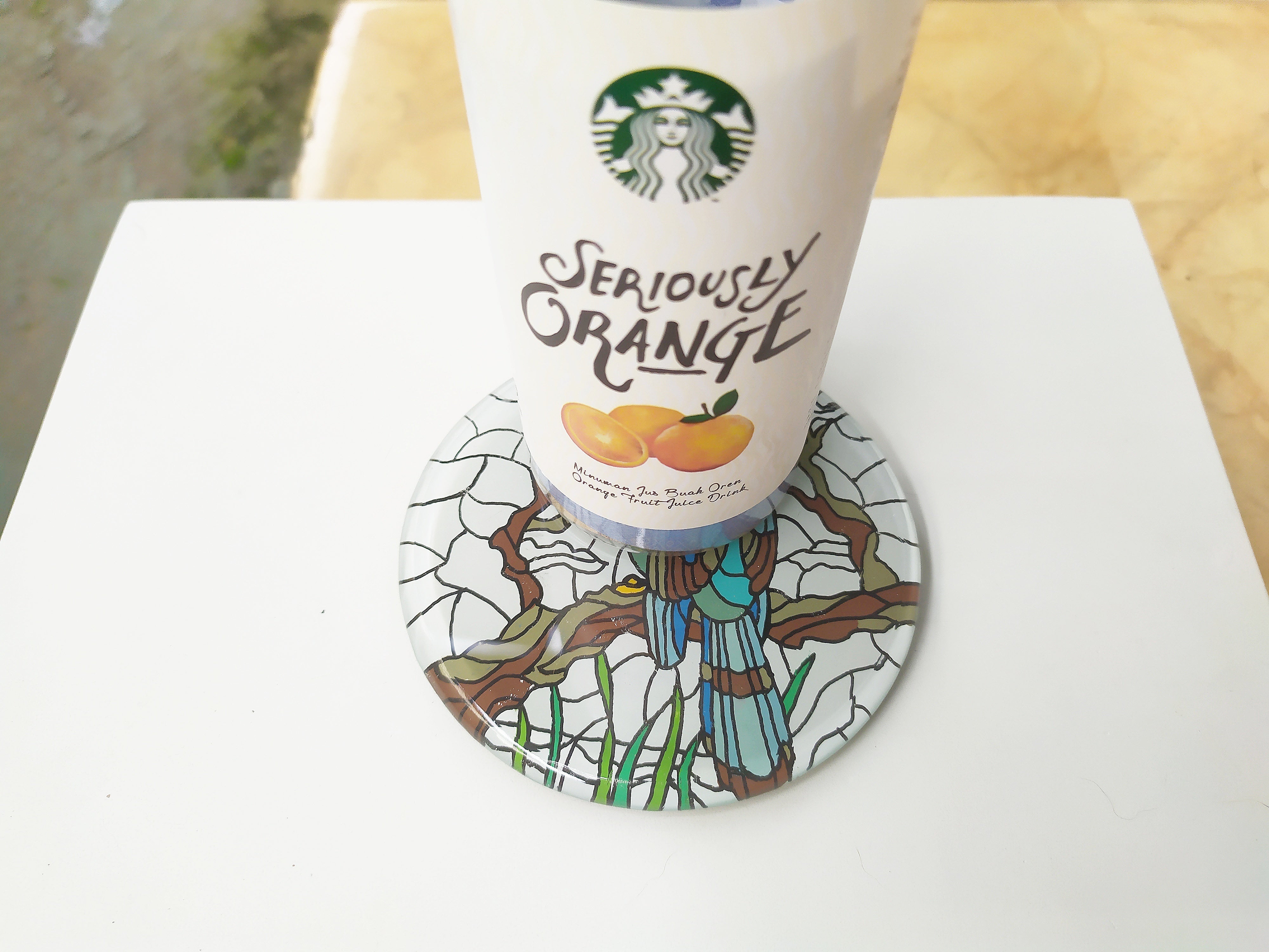 Mirror and glass hand painted bird coaster , with stacbucks cup