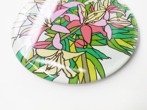 Reverse Painted Lilly round mirror coaster, zoomed for details