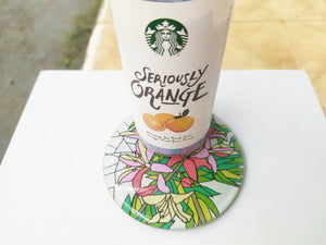 Reverse Painted Lilly round mirror coaster , with starbucks cup